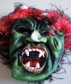 Alerta de Consumo - M�scara de demonio verde con pelo rojo